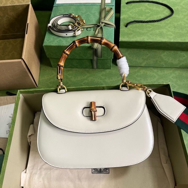 G*u*i top handle bags